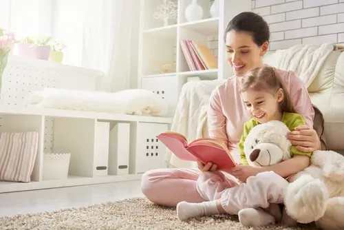 girl-and-mother-reading-together